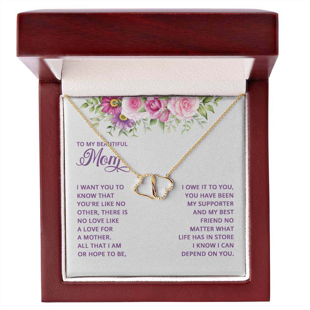 Everlasting Love Mom necklace with 10K gold hearts and diamonds in mahogany gift box.