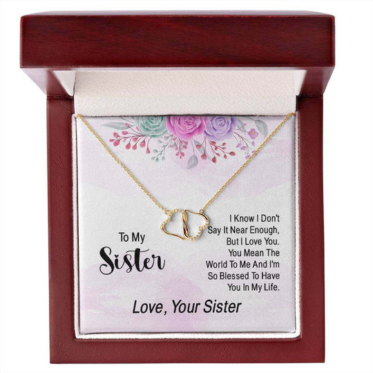 10K yellow gold heart necklace with diamonds in a mahogany gift box, Everlasting Love Sister.