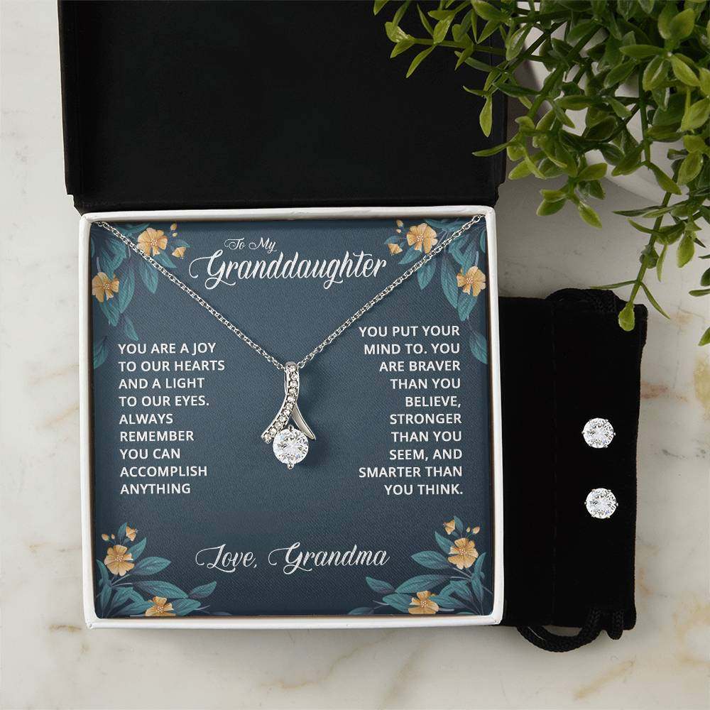 JewelryAlluring Beauty + Clear CZ Earrings GranddaughterImagine her reaction when your loved one opens this stunning gift! The Alluring Beauty Necklace and Cubic Zirconia Earring Set is a sweet treat that is sure to dazzlAlluring Beauty + Clear CZ Earrings Granddaughter