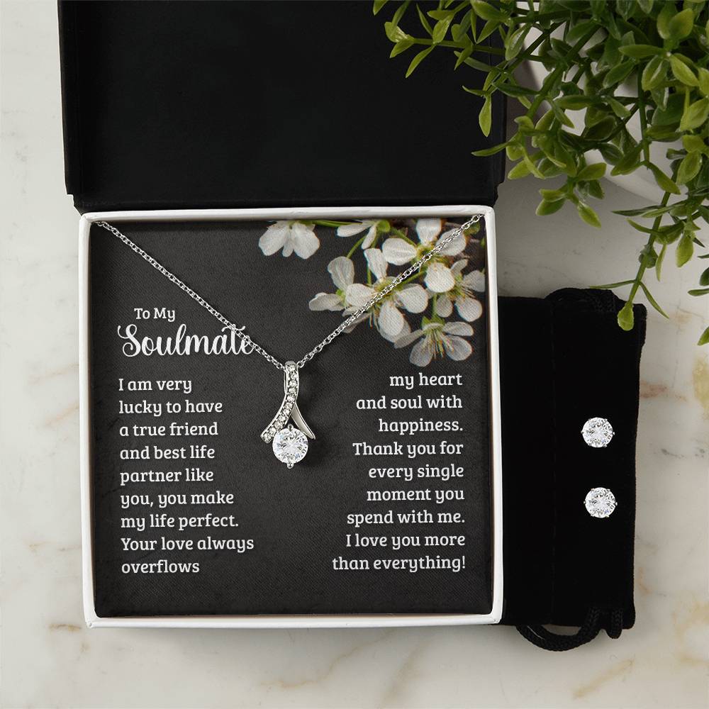 JewelryAlluring Beauty + Clear CZ Earrings SoulmateImagine her reaction when your loved one opens this stunning gift! The Alluring Beauty Necklace and Cubic Zirconia Earring Set is a sweet treat that is sure to dazzlAlluring Beauty + Clear CZ Earrings Soulmate