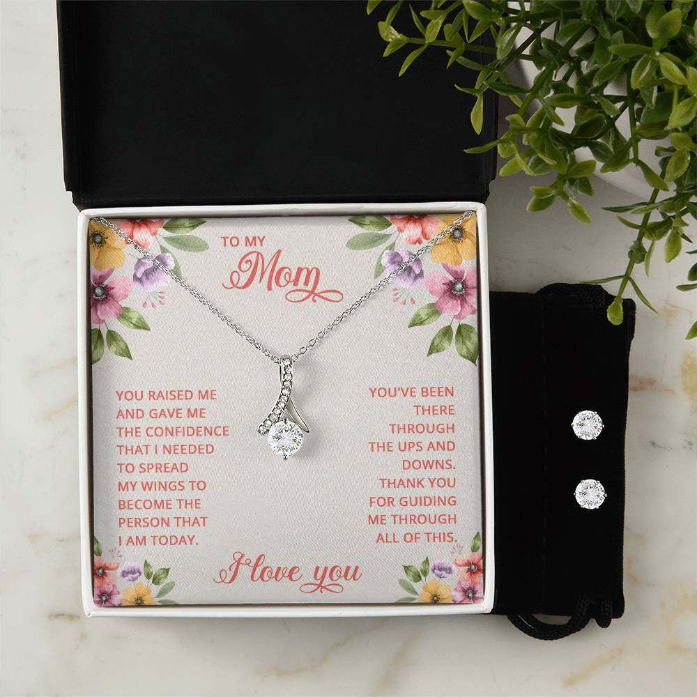 JewelryAlluring Beauty + Clear CZ Earrings My MomImagine her reaction when your loved one opens this stunning gift! The Alluring Beauty Necklace and Cubic Zirconia Earring Set is a sweet treat that is sure to dazzlAlluring Beauty + Clear CZ Earrings My Mom