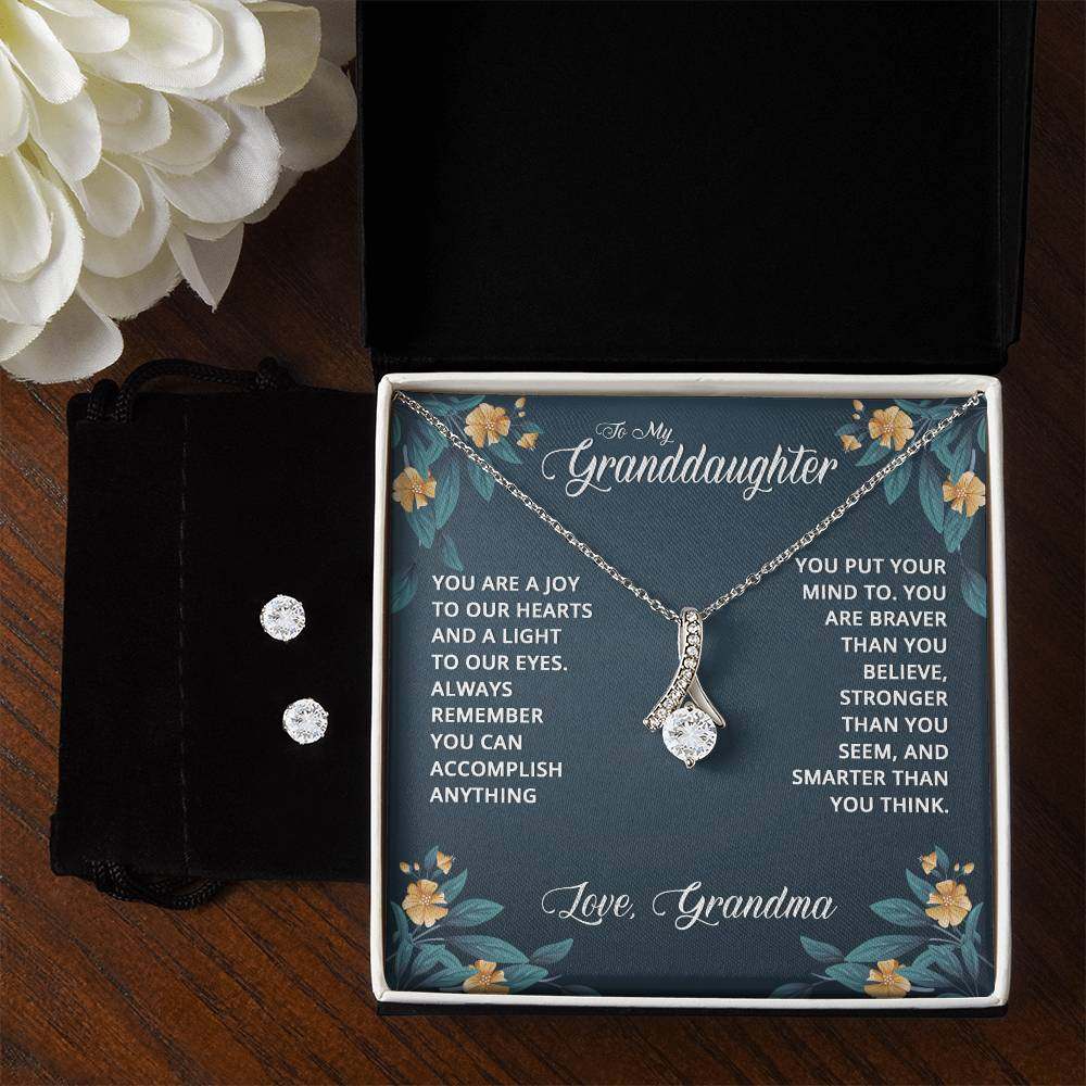 JewelryAlluring Beauty + Clear CZ Earrings GranddaughterImagine her reaction when your loved one opens this stunning gift! The Alluring Beauty Necklace and Cubic Zirconia Earring Set is a sweet treat that is sure to dazzlAlluring Beauty + Clear CZ Earrings Granddaughter