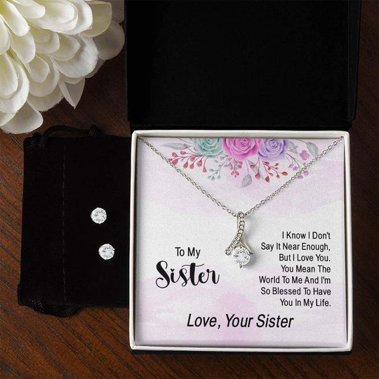 JewelryAlluring Beauty + Clear CZ Earrings SisterImagine her reaction when your loved one opens this stunning gift! The Alluring Beauty Necklace and Cubic Zirconia Earring Set is a sweet treat that is sure to dazzlAlluring Beauty + Clear CZ Earrings Sister