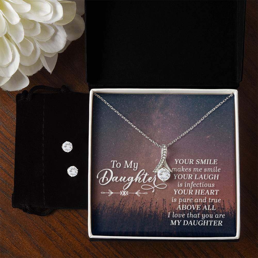 JewelryAlluring Beauty + Clear CZ Earrings DaughterImagine her reaction when your loved one opens this stunning gift! The Alluring Beauty Necklace and Cubic Zirconia Earring Set is a sweet treat that is sure to dazzlAlluring Beauty + Clear CZ Earrings Daughter