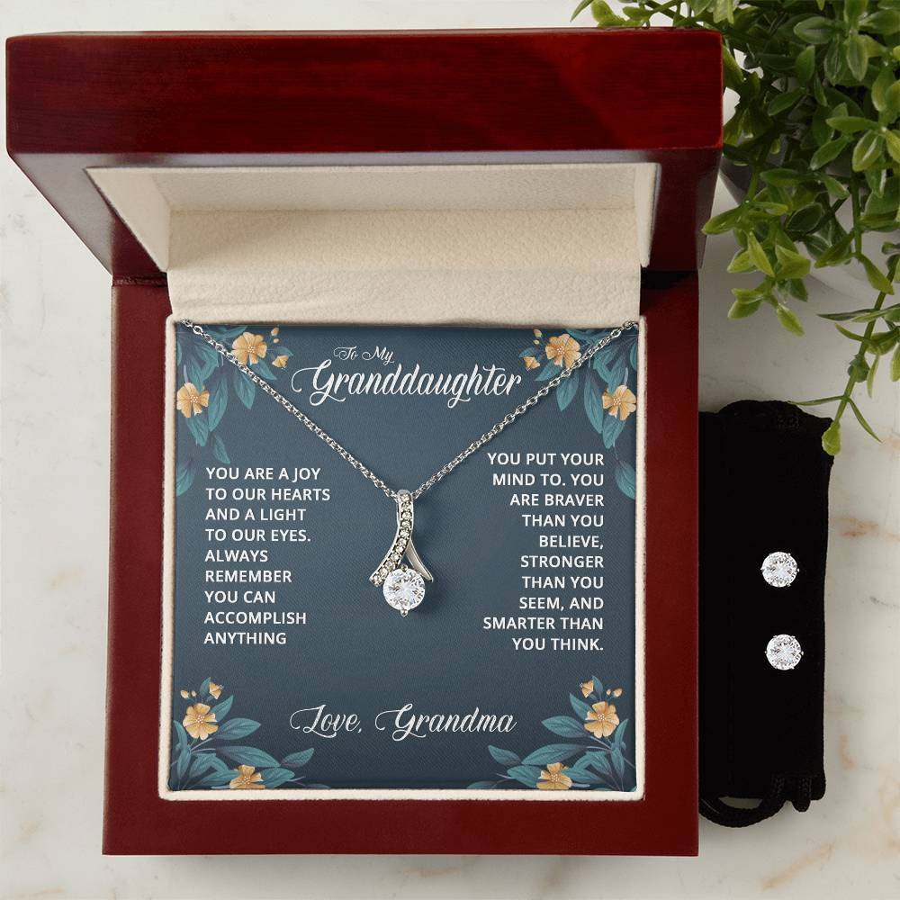 JewelryAlluring Beauty + Clear CZ Earrings GranddaughterImagine her reaction when your loved one opens this stunning gift! The Alluring Beauty Necklace and Cubic Zirconia Earring Set is a sweet treat that is sure to dazzlAlluring Beauty + Clear CZ Earrings Granddaughter