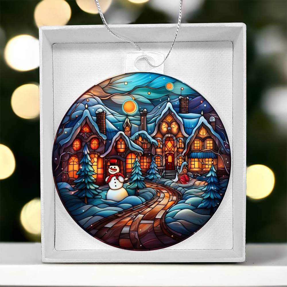 Acrylic Ornament Towns Frosty with vibrant snowy village design displayed in gift box.