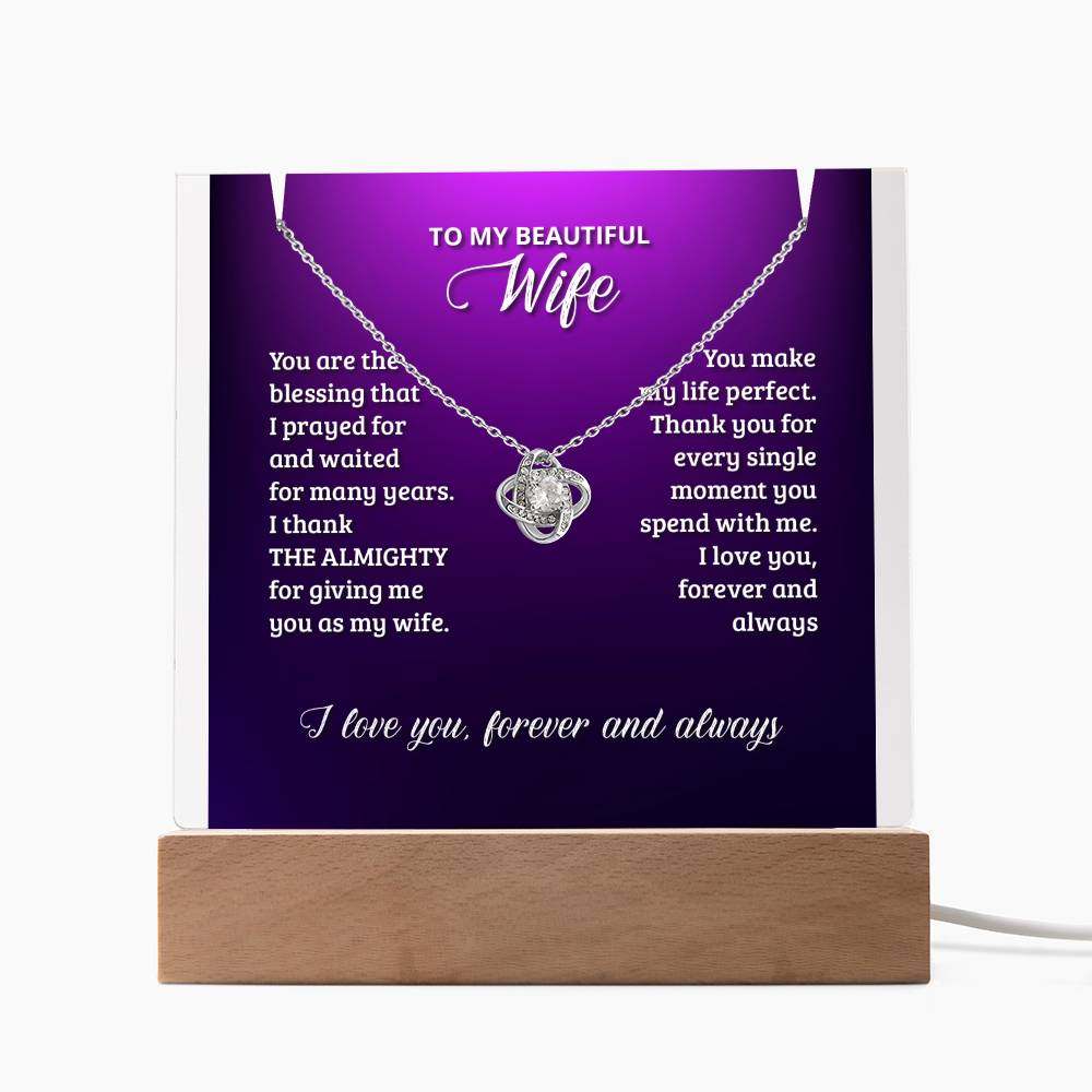 Elegant Keepsake Acrylic Bundle with Love Knot Necklace for Beautiful Wife, displayed on wooden LED base with customizable lighting options. Perfect gift for special occasions.